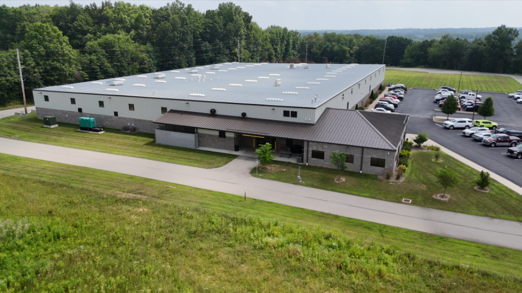 Warehouse for manufacturing with parking lot